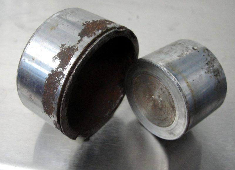 annual brake fluid change prevent rusted brake pistons